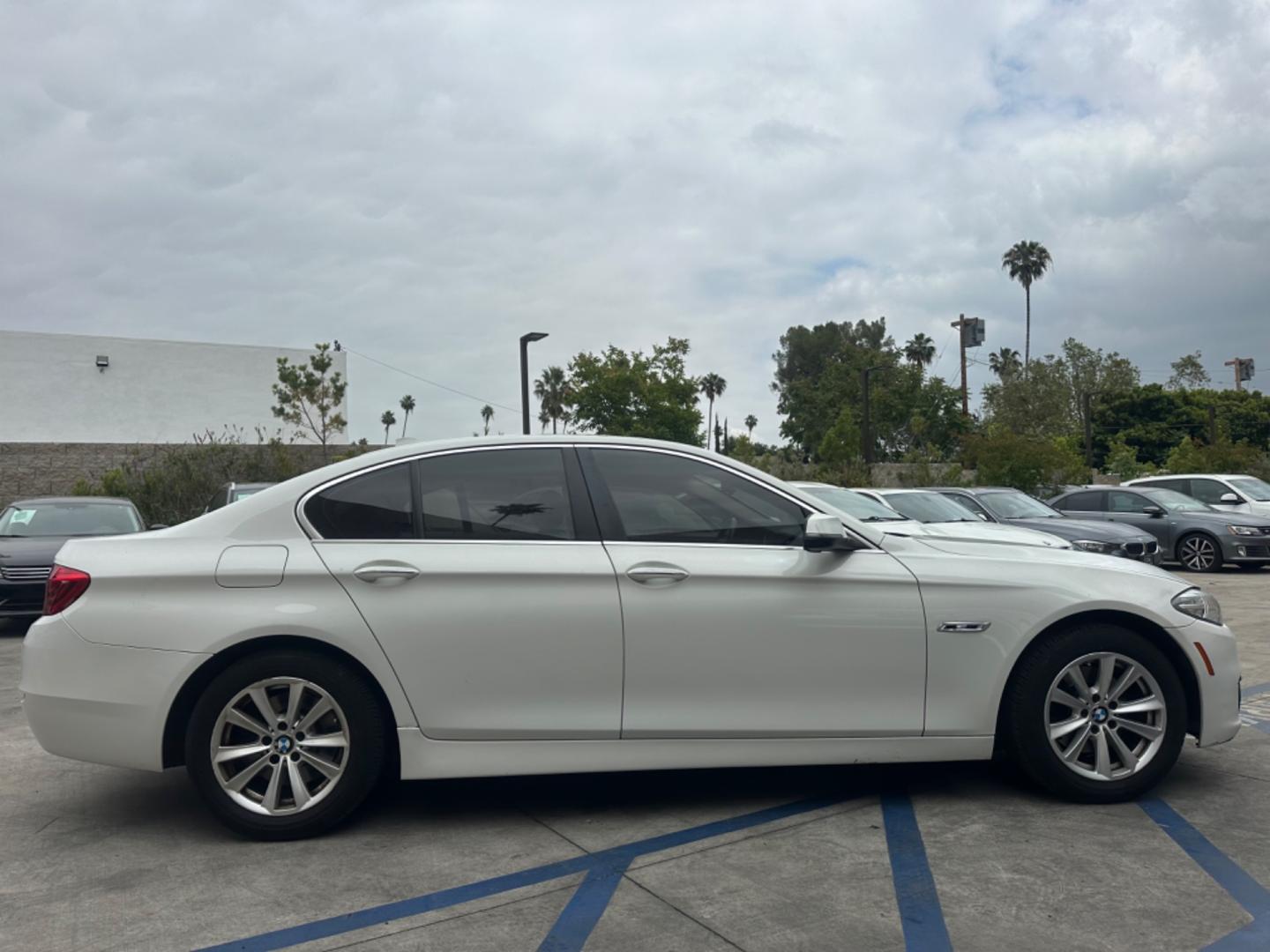 2015 WHITE /Black BMW 5-Series Leather (WBA5A7C54FG) with an 4 Cylinder engine, Automatic transmission, located at 30 S. Berkeley Avenue, Pasadena, CA, 91107, (626) 248-7567, 34.145447, -118.109398 - The 2015 BMW 528i xDrive stands as a beacon of luxury, performance, and advanced technology, embodying the pinnacle of German engineering. With only 72,430 miles, this well-maintained vehicle offers a remarkable driving experience that combines comfort, style, and reliability. Whether you have an im - Photo#5